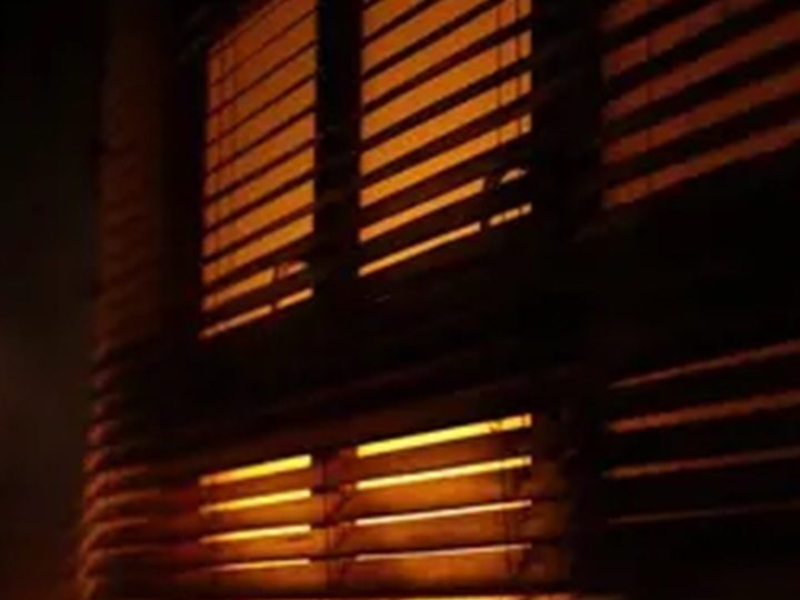 Night light dimmed through blinds